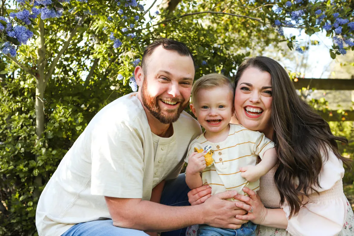 A happy family, with beautiful smiles.